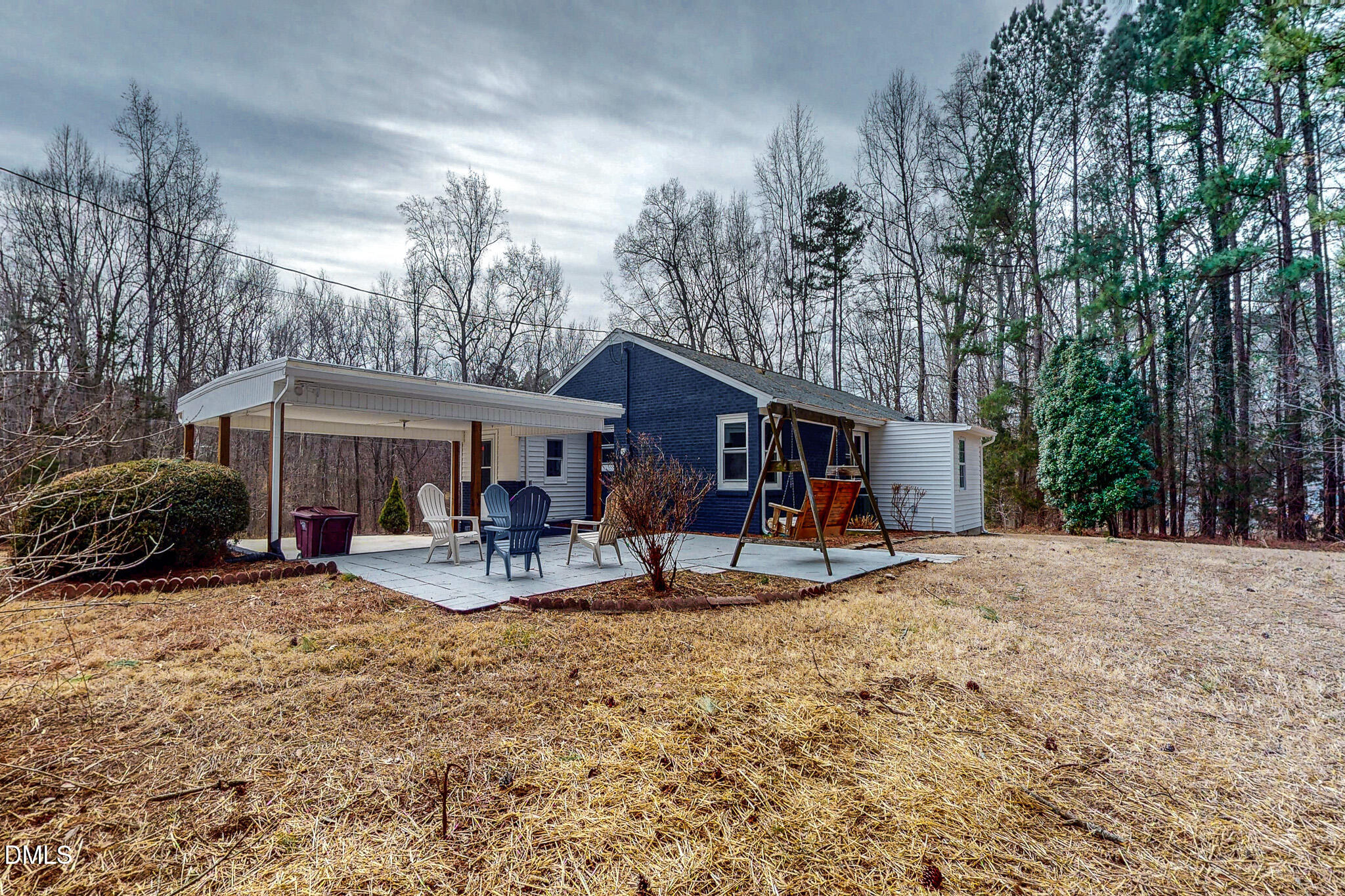 844 Holeman Ashley Road Timberlake, NC 27583 - Photo 23 of 58 a view of a house with a yard and sitting area