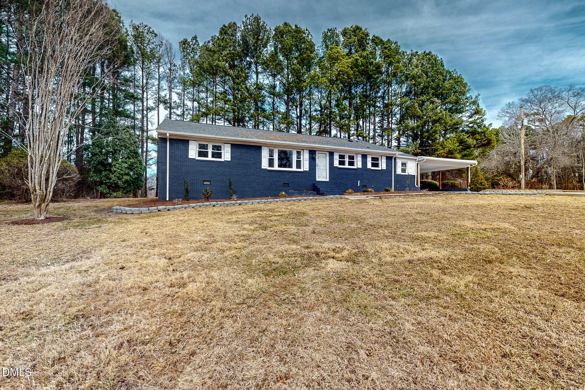 844 Holeman Ashley Road Timberlake, NC 27583 - Photo 27 of 58 a view of a house with a yard