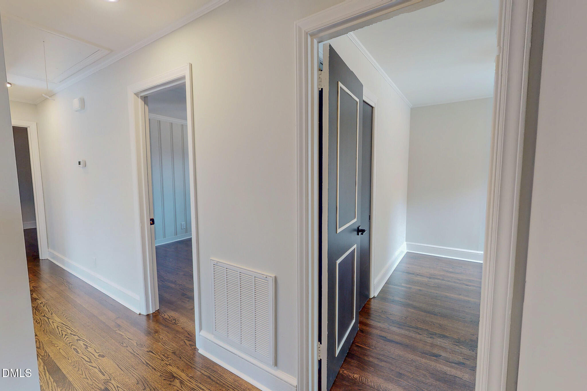 844 Holeman Ashley Road Timberlake, NC 27583 - Photo 40 of 58 a view of a hallway with wooden floor