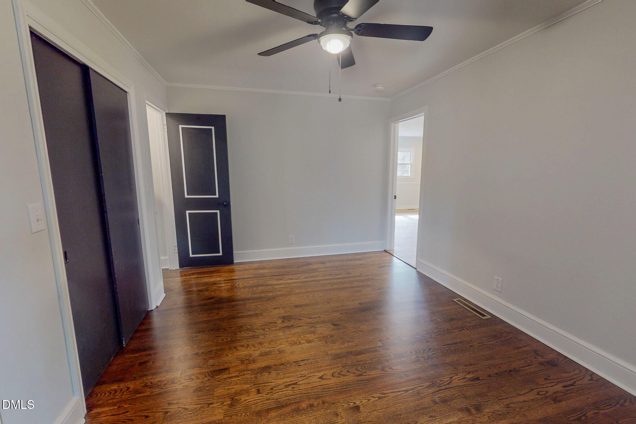 844 Holeman Ashley Road Timberlake, NC 27583 - Photo 48 of 58 wooden floor in an empty room with a window