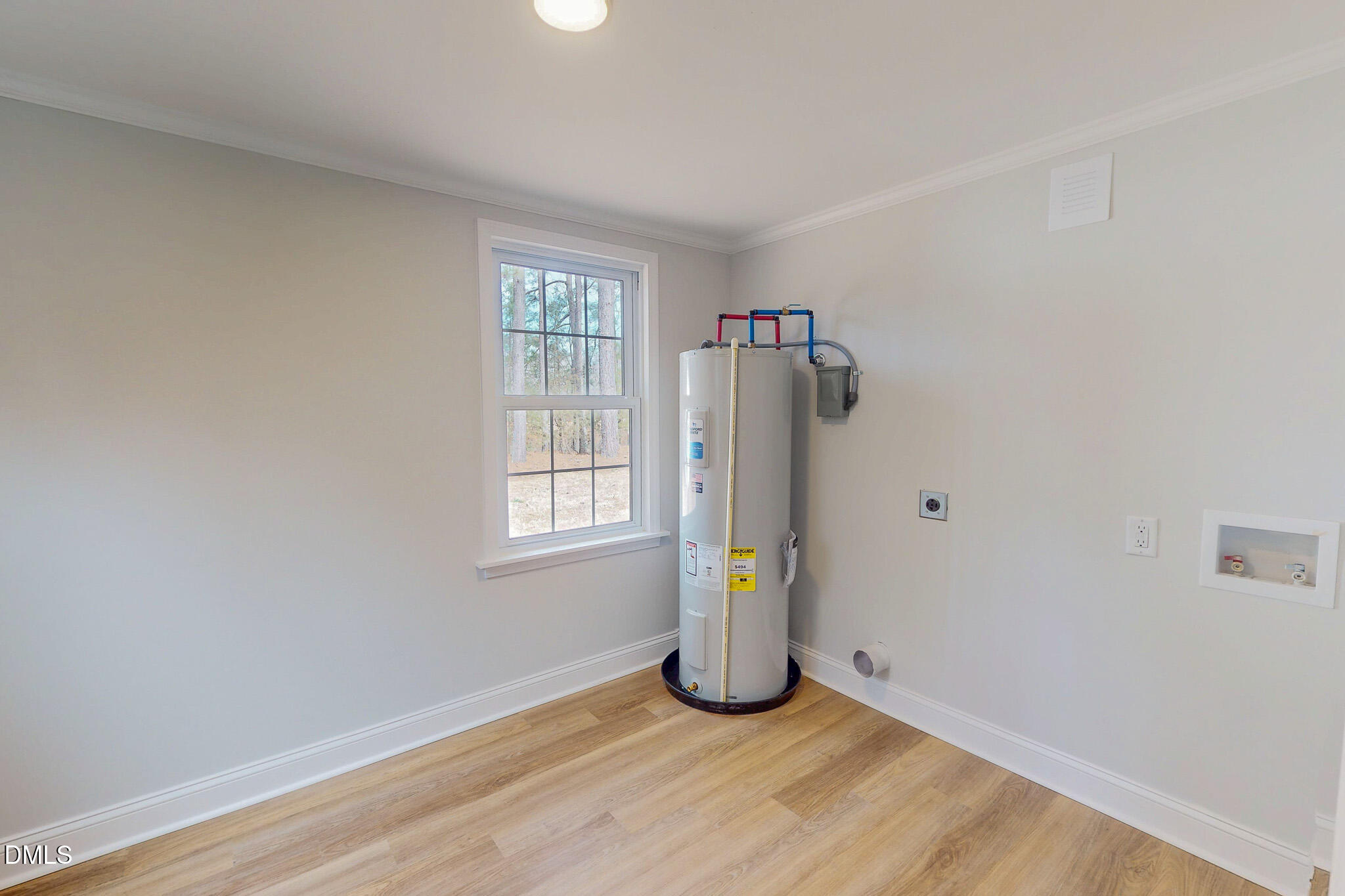 844 Holeman Ashley Road Timberlake, NC 27583 - Photo 50 of 58 a view of an empty room with a window