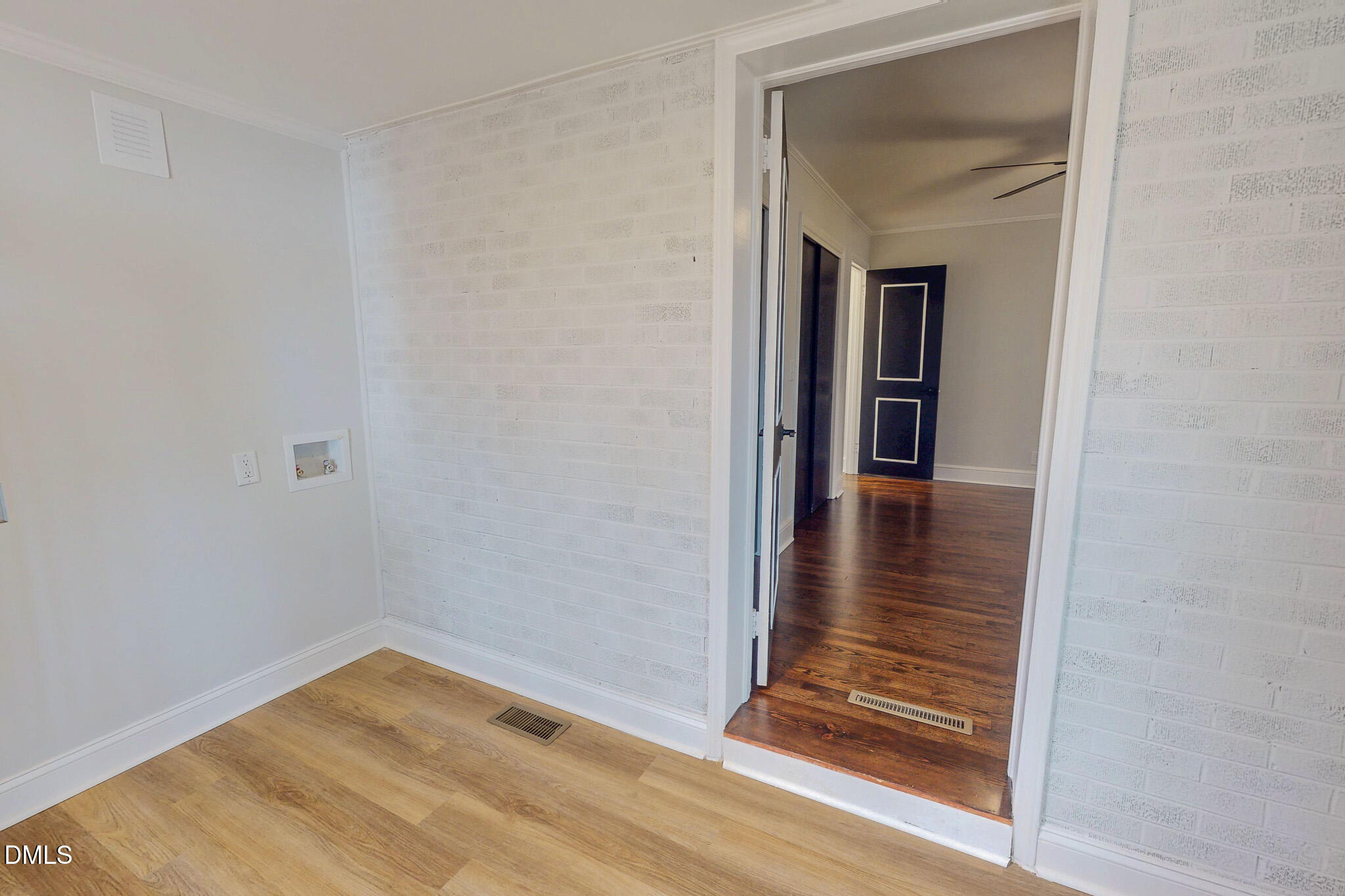 844 Holeman Ashley Road Timberlake, NC 27583 - Photo 51 of 58 a view of a hallway with wooden floor