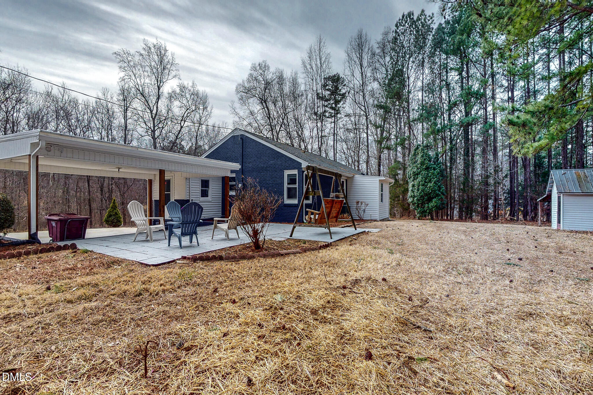 844 Holeman Ashley Road Timberlake, NC 27583 - Photo 53 of 58 a view of a house with backyard porch and sitting area