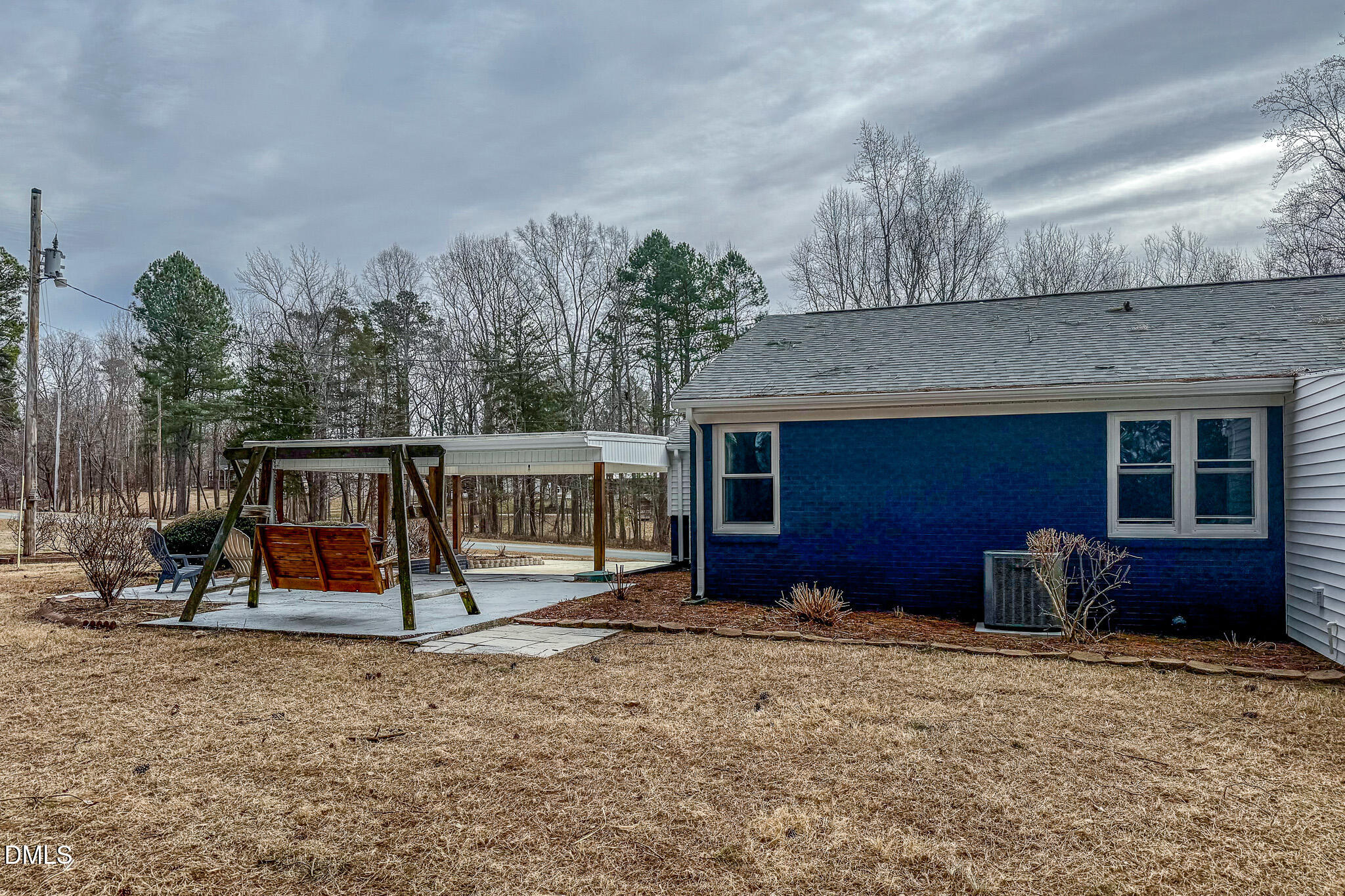 844 Holeman Ashley Road Timberlake, NC 27583 - Photo 56 of 58 a view of a house with a backyard