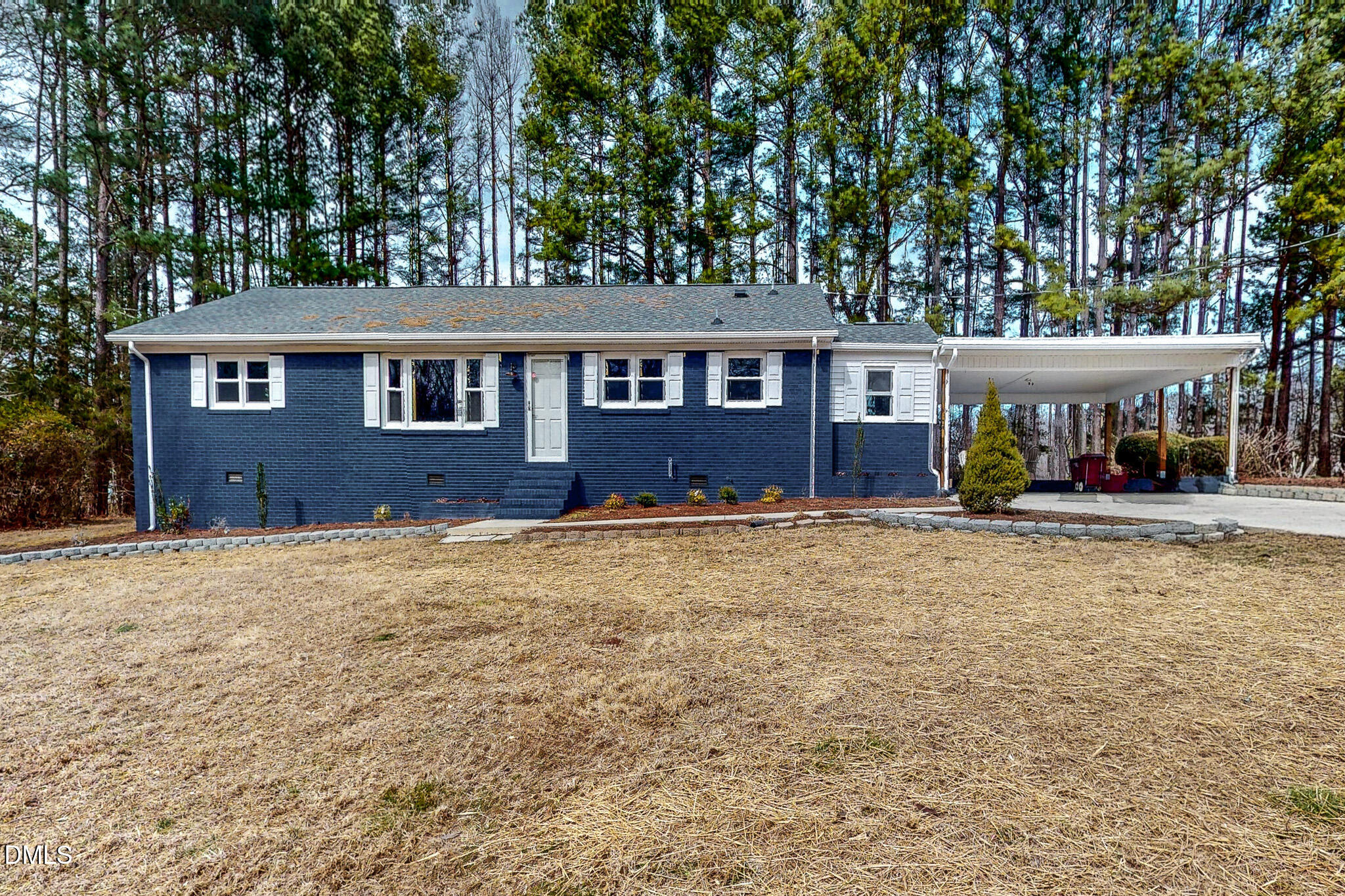 844 Holeman Ashley Road Timberlake, NC 27583 - Photo 6 of 58 front view of a house with a yard