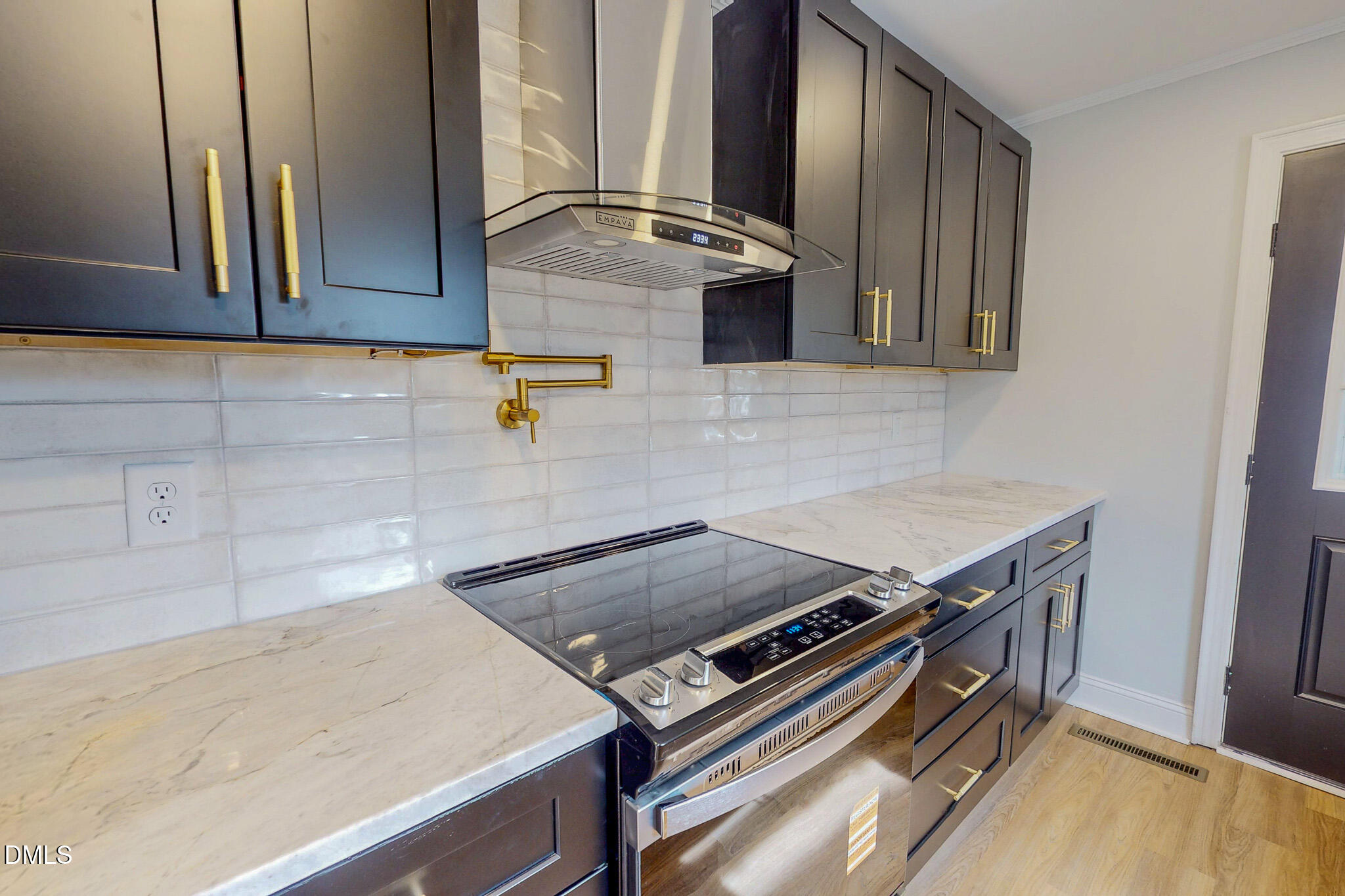 844 Holeman Ashley Road Timberlake, NC 27583 - Photo 8 of 58 a stove top oven sitting inside of a kitchen
