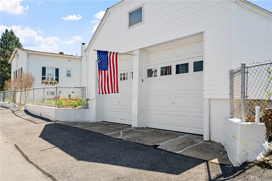 73 Mowry Street Woonsocket, RI 02895 - Photo 24 of 34 Garage has complete second level. Stairway from inside garage.