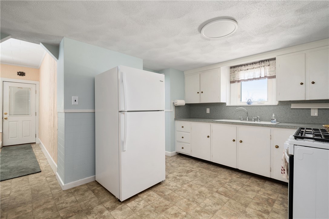73 Mowry Street Woonsocket, RI 02895 - Photo 4 of 34 View from kitchen into living room