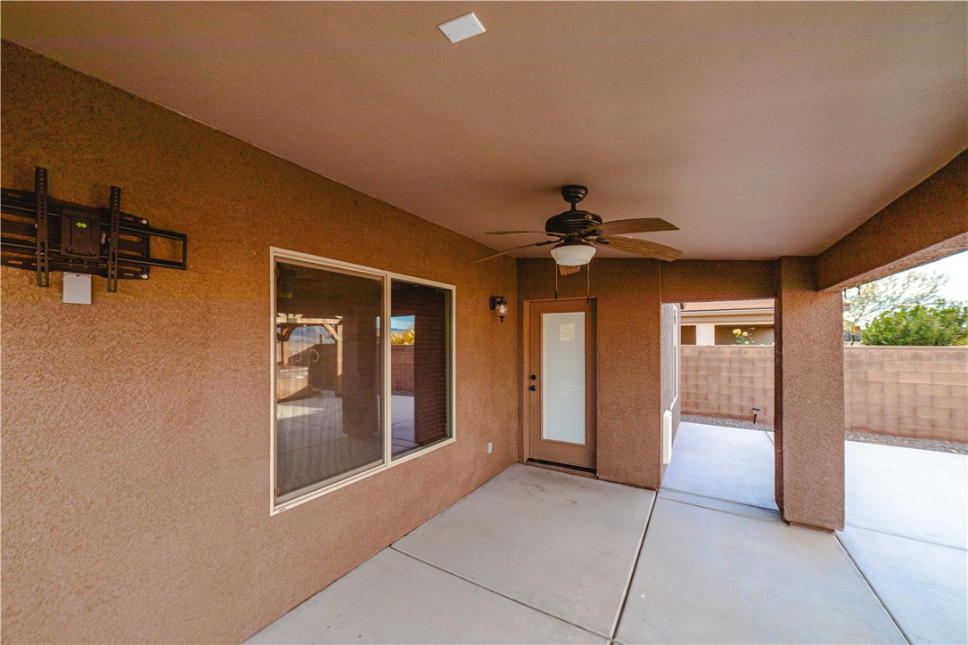 3379 Motherload Road Kingman, AZ 86401 - Photo 11 of 67 View of patio / terrace featuring a ceiling fan
