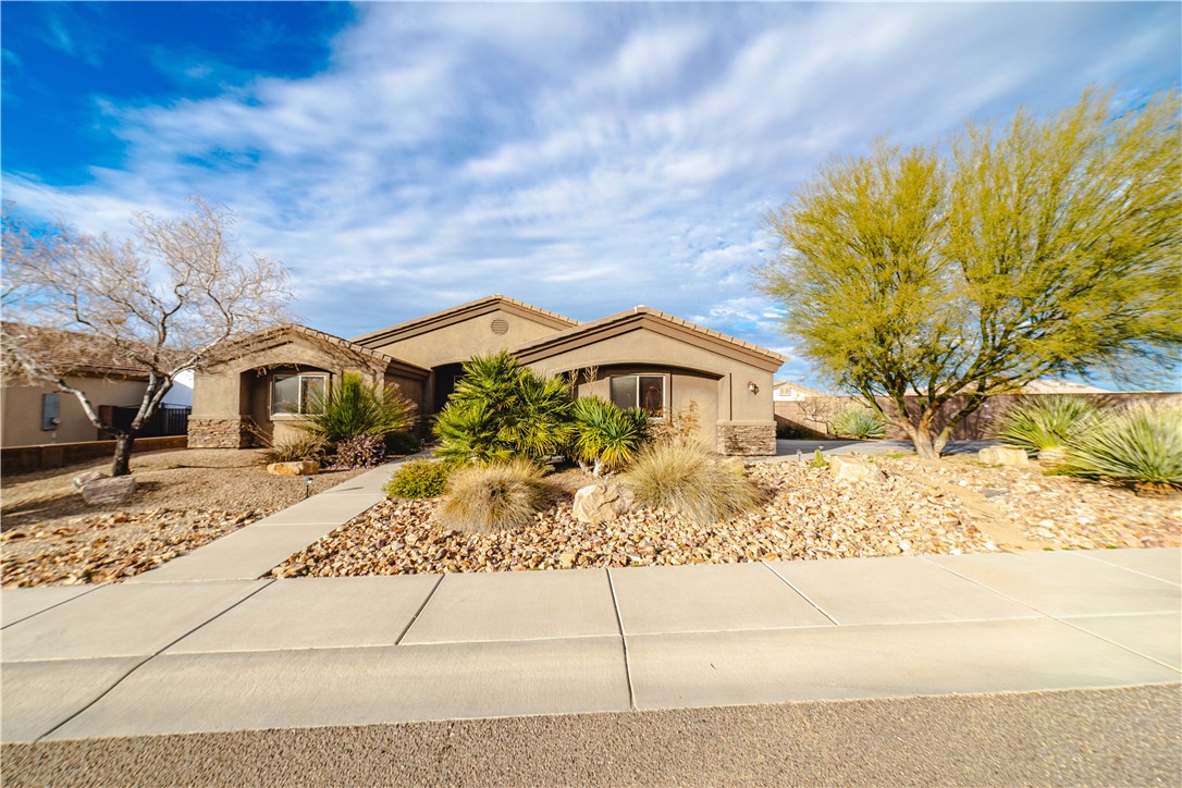 3379 Motherload Road Kingman, AZ 86401 - Photo 2 of 67 View of front of property featuring stucco siding and stone siding