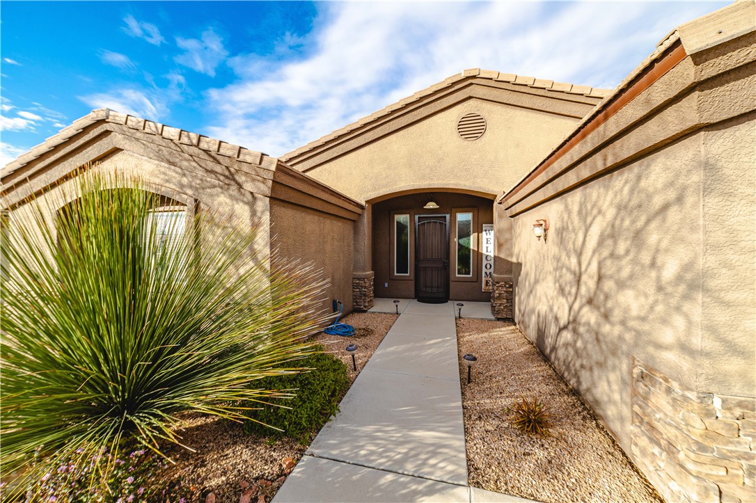 3379 Motherload Road Kingman, AZ 86401 - Photo 3 of 67 Doorway to property with stucco siding