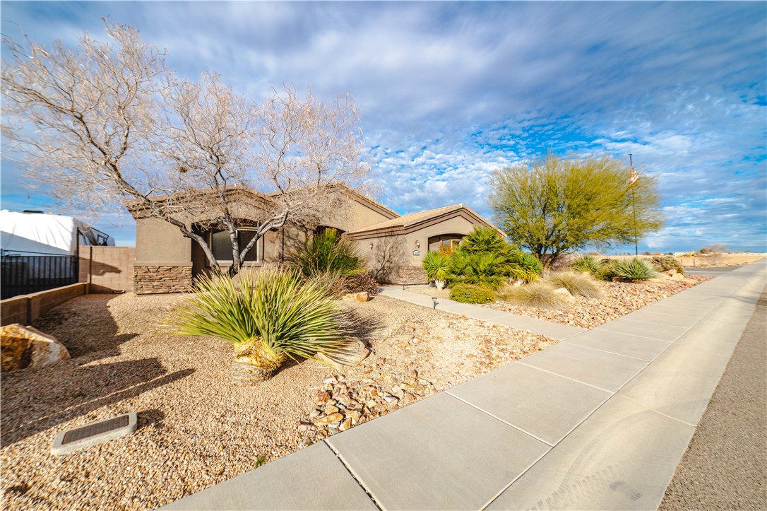 3379 Motherload Road Kingman, AZ 86401 - Photo 44 of 67 View of front of house featuring stucco siding