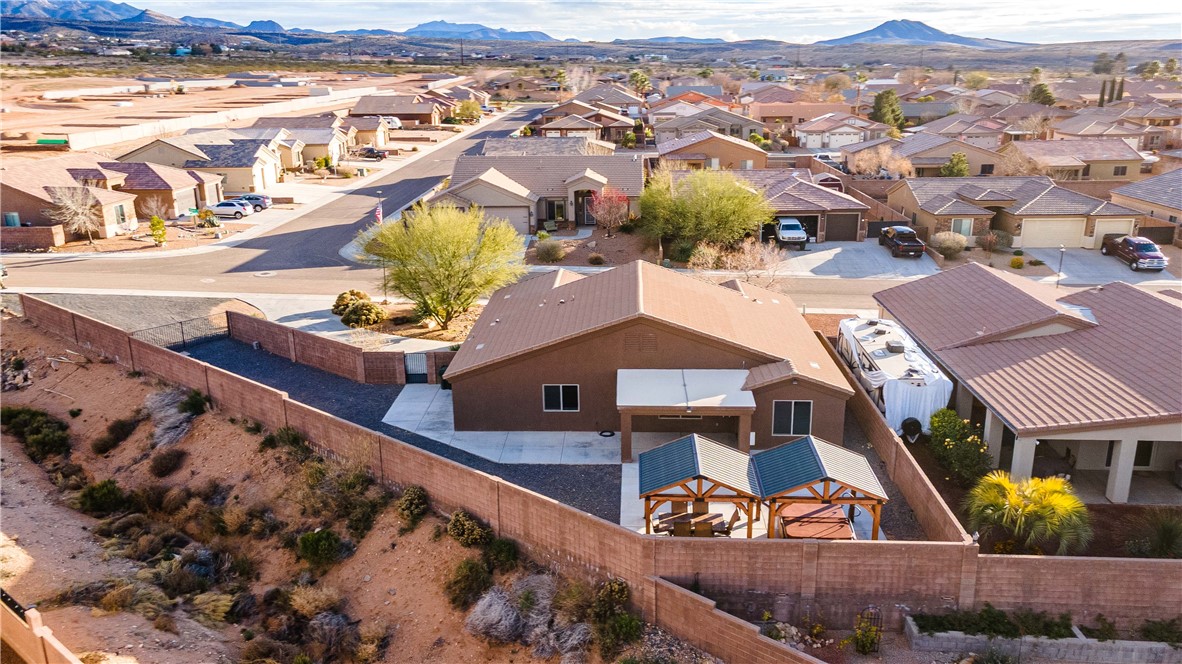 3379 Motherload Road Kingman, AZ 86401 - Photo 59 of 67 Aerial perspective of suburban area with a mountain backdrop