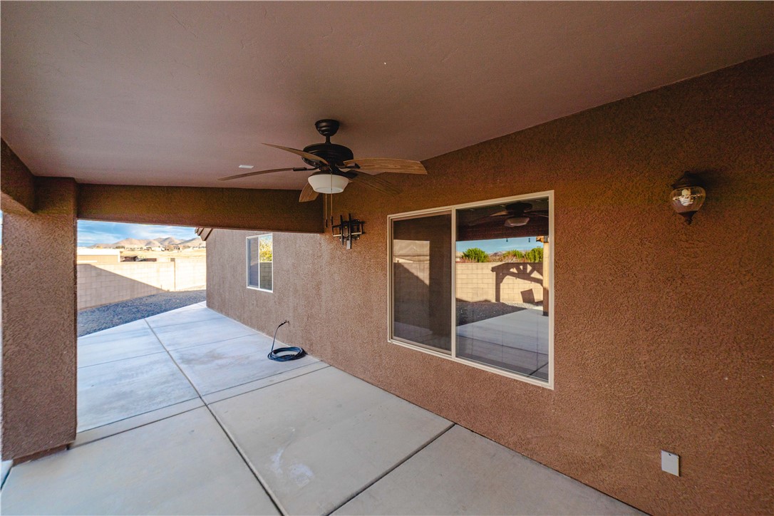 3379 Motherload Road Kingman, AZ 86401 - Photo 10 of 67 View of patio with a ceiling fan