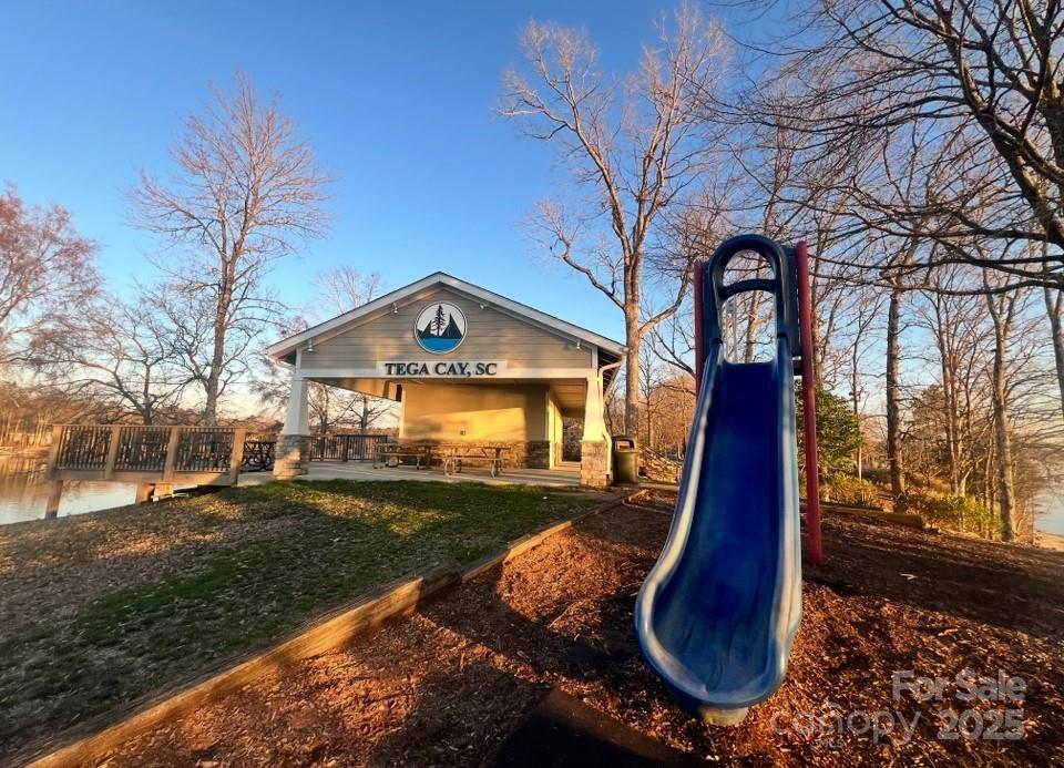 9009 Cebu Court Fort Mill, SC 29708 - Photo 35 of 35 a front view of a house with yard and green space
