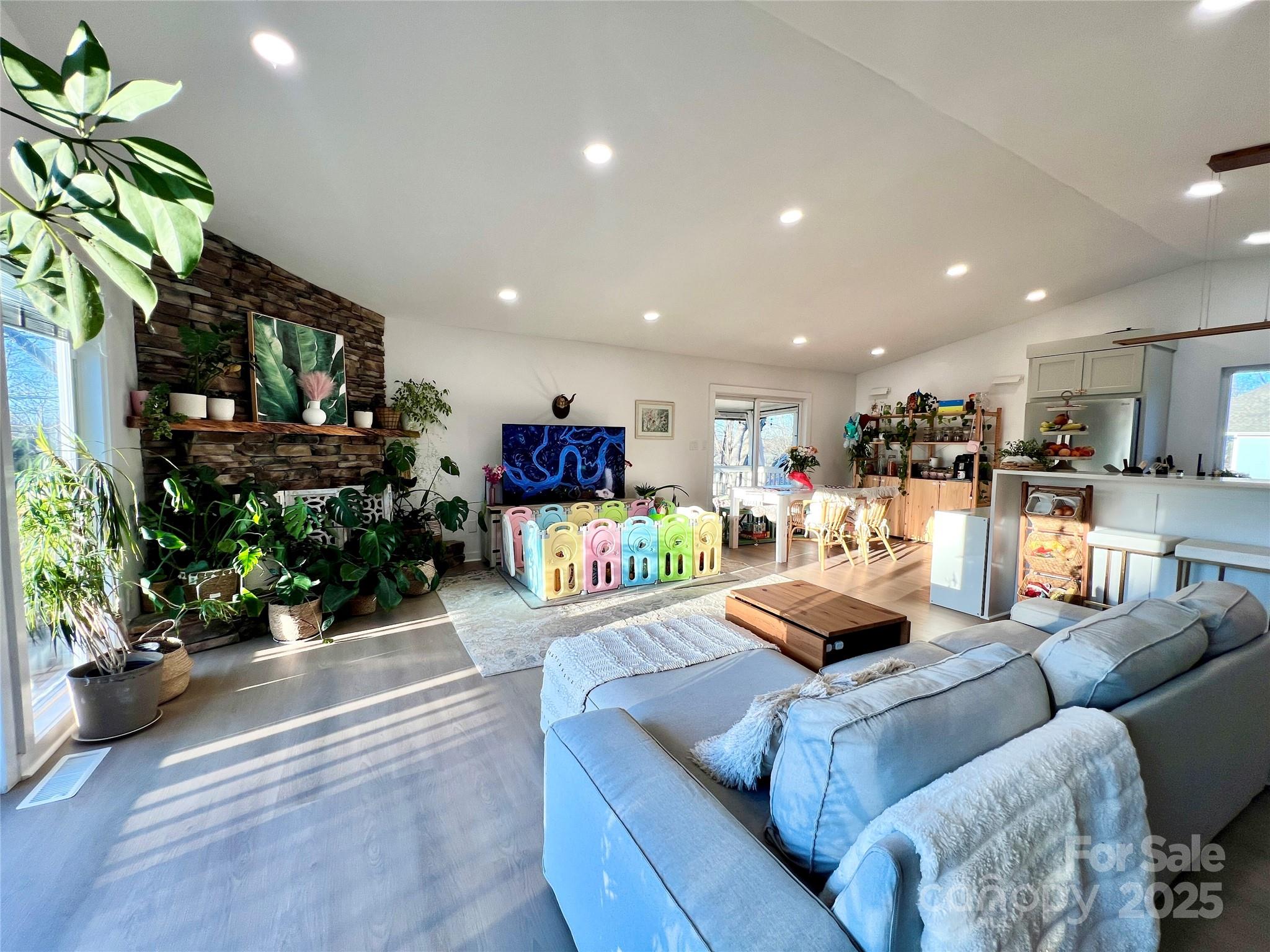 9009 Cebu Court Fort Mill, SC 29708 - Photo 7 of 35 a living room with furniture and a flat screen tv