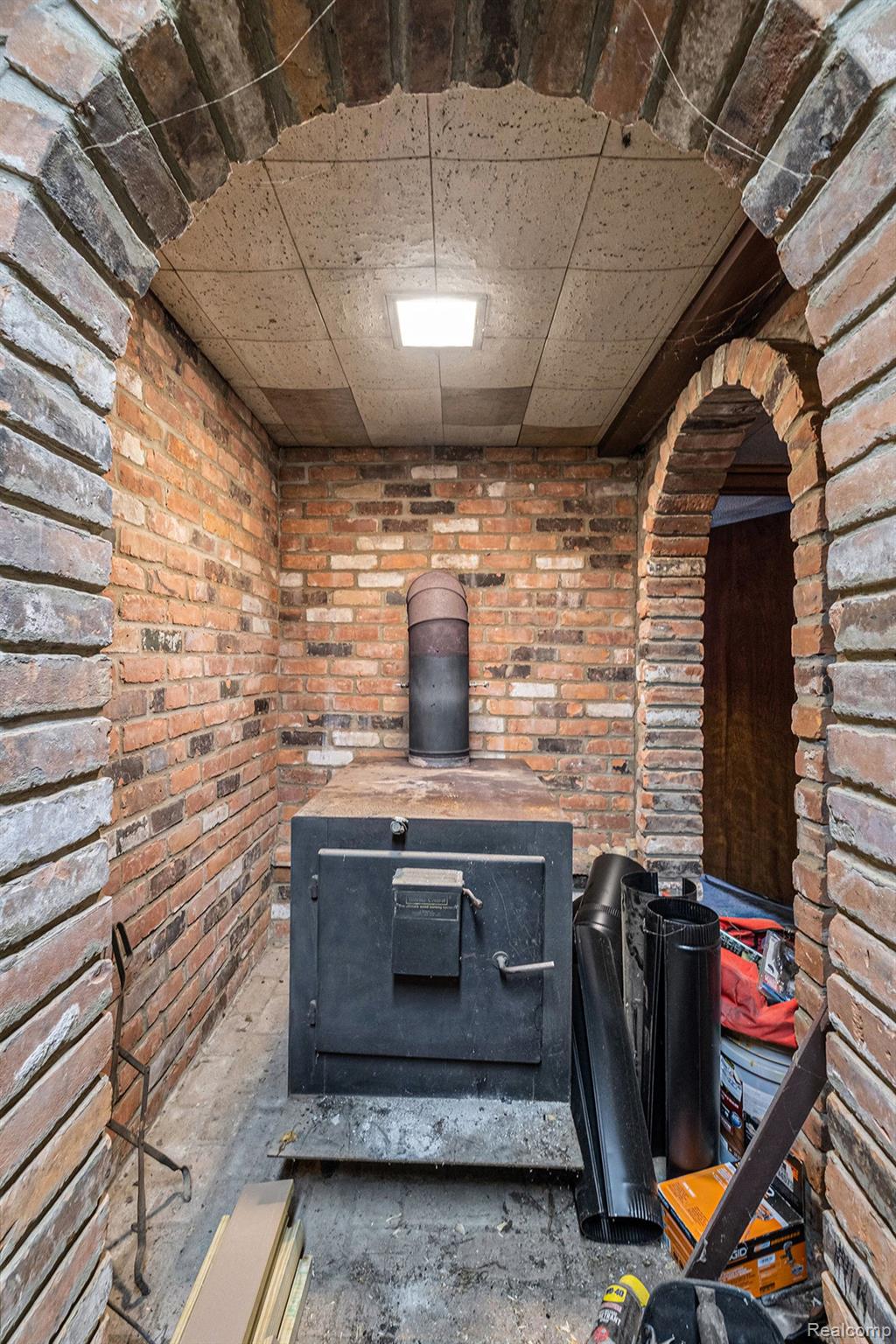 12461 Scott Road Davisburg, MI 48350 - Photo 11 of 20 LowerLevel-Woodburner