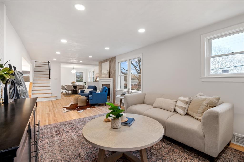 107 Marlboro Road Pittsburgh, PA 15238 - Photo 6 of 45 a living room with furniture kitchen view and large windows