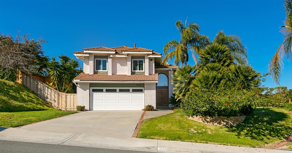 1418 Village View Road Encinitas, CA 92024 - Photo 1 of 1 a front view of a house with a yard