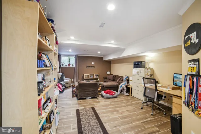 a living room with lots of furniture and a flat screen tv