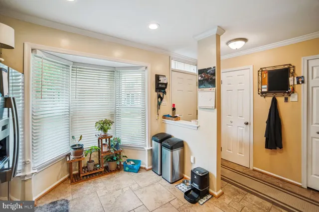 a view of livingroom with furniture and natural light
