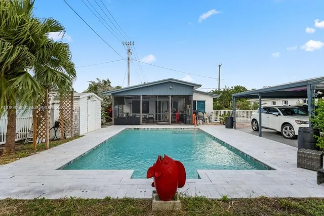 a view of a house with a yard porch and sitting area
