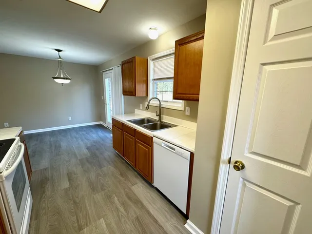 a room with sink and mirror