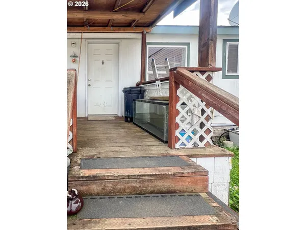 a kitchen view with a stove and a microwave