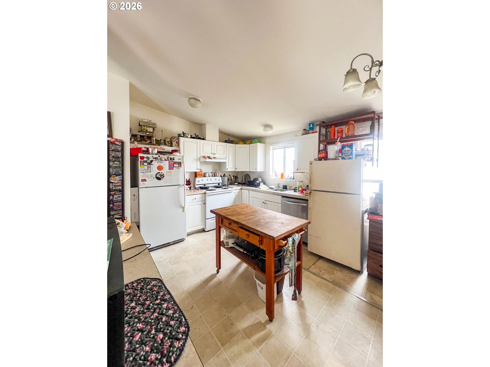 1580 Winston Section Road Winston, OR 97496 - Photo 6 of 11 a living room with furniture and a dining table