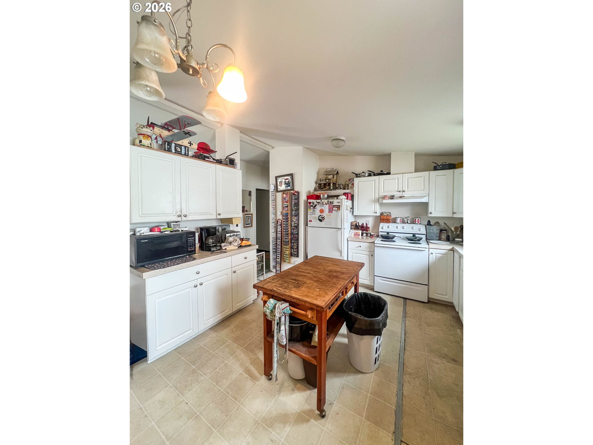 1580 Winston Section Road Winston, OR 97496 - Photo 7 of 11 a room with furniture and white appliances