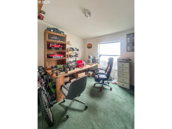 a workspace with furniture and a window