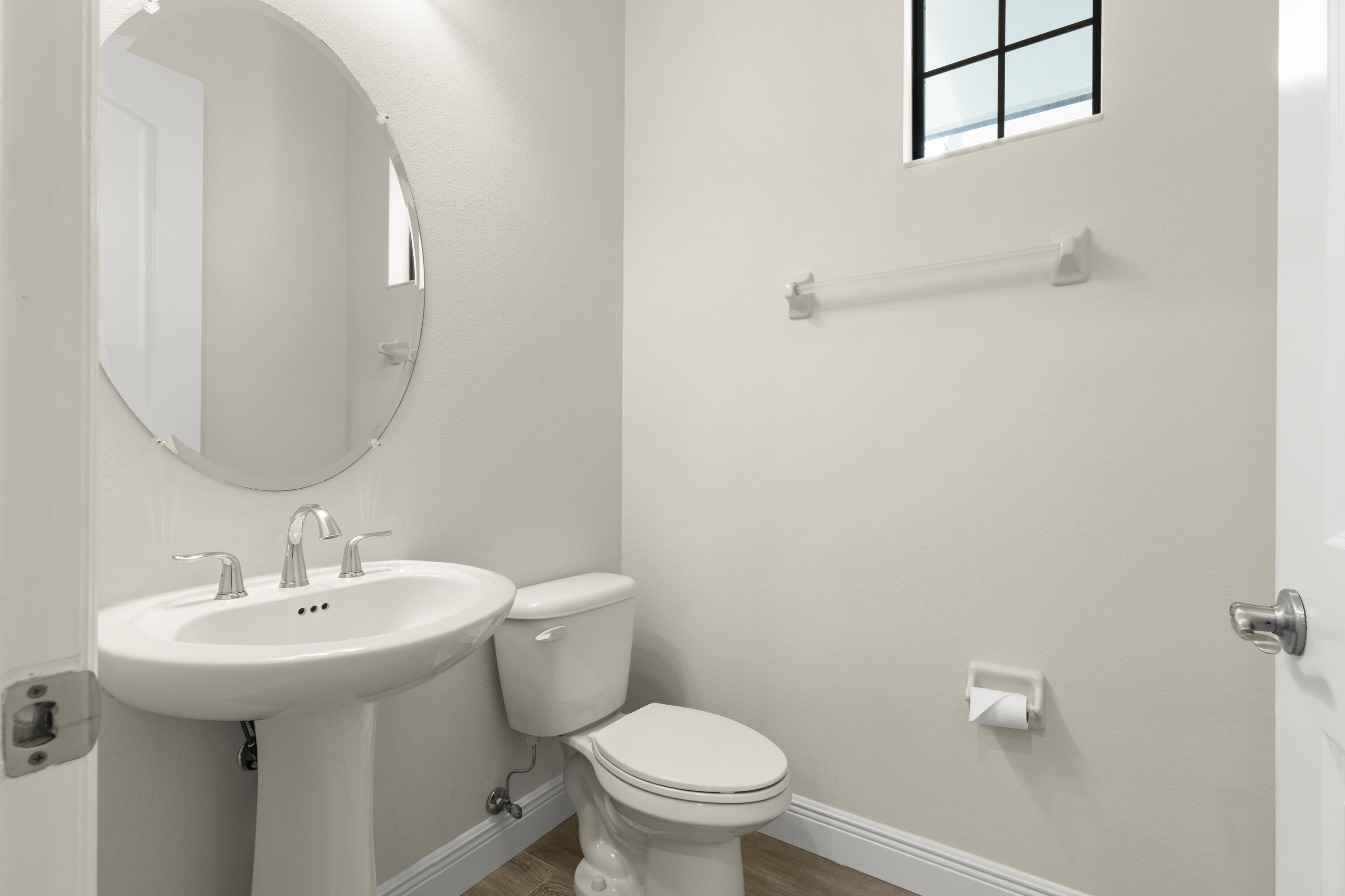 7065 Primavera Lane Melbourne, FL 32940 - Photo 11 of 40 a bathroom with a sink toilet and a mirror