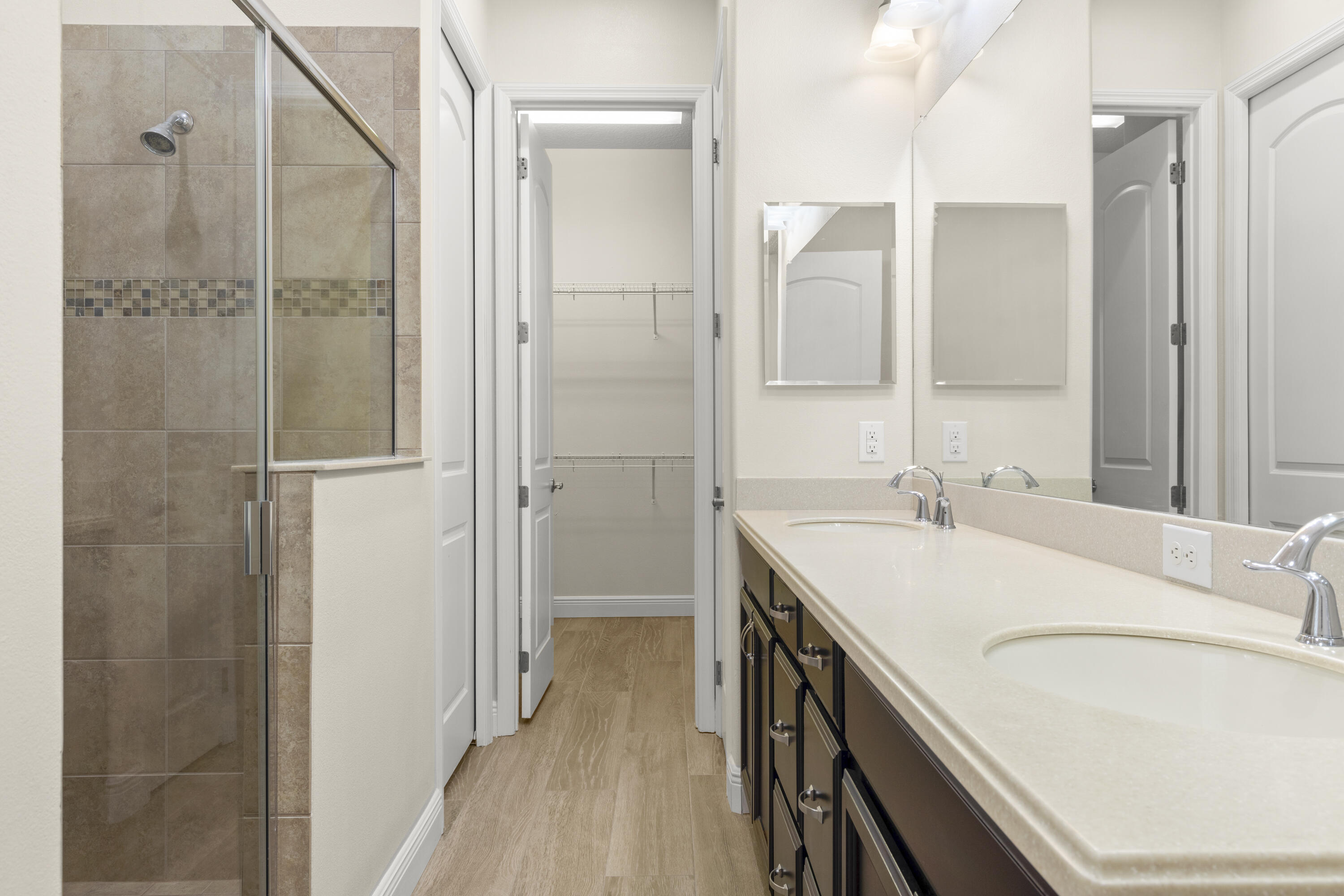 7065 Primavera Lane Melbourne, FL 32940 - Photo 15 of 40 a bathroom with a sink and a mirror