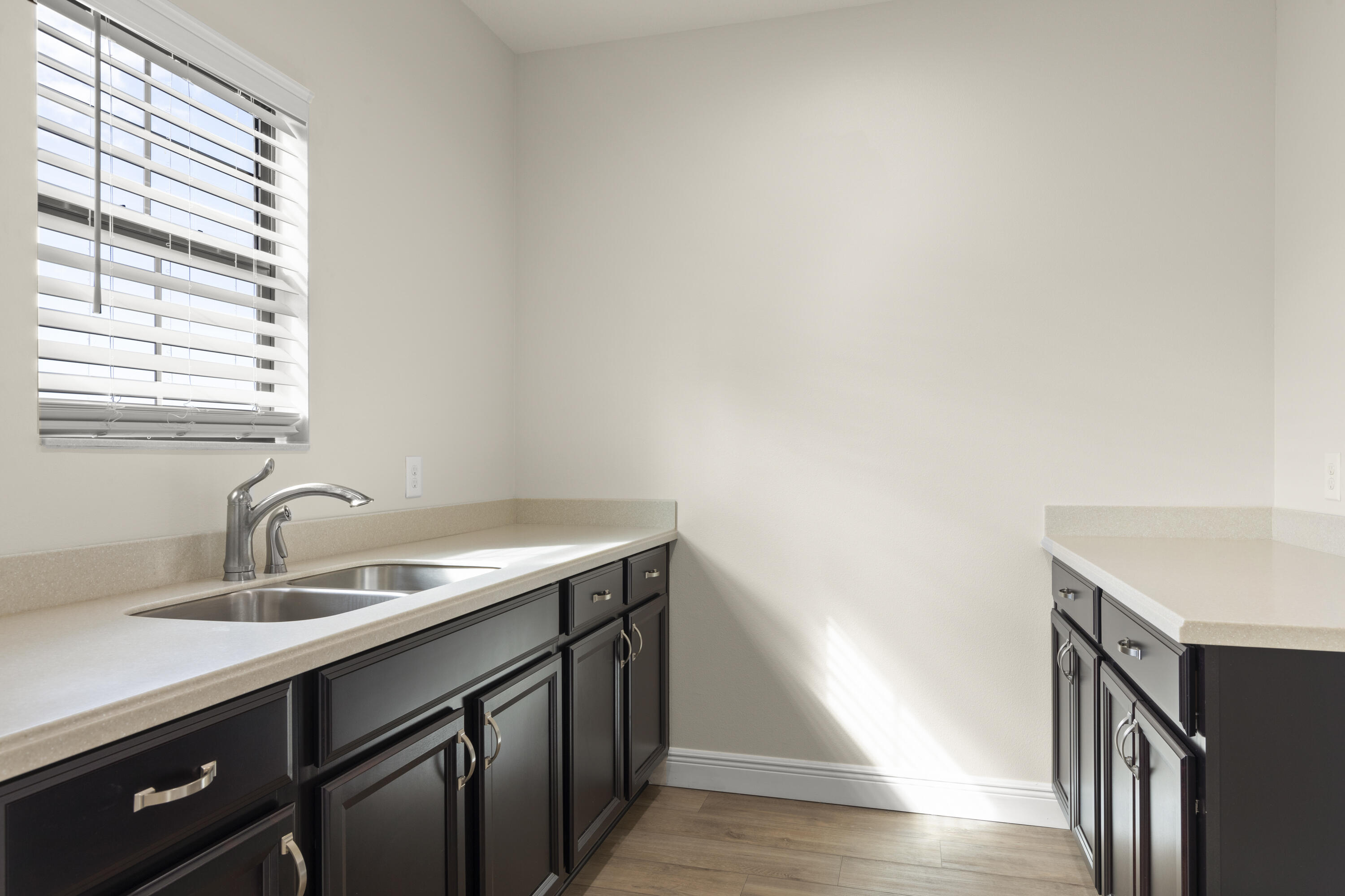 7065 Primavera Lane Melbourne, FL 32940 - Photo 24 of 40 a bathroom with a sink and a window