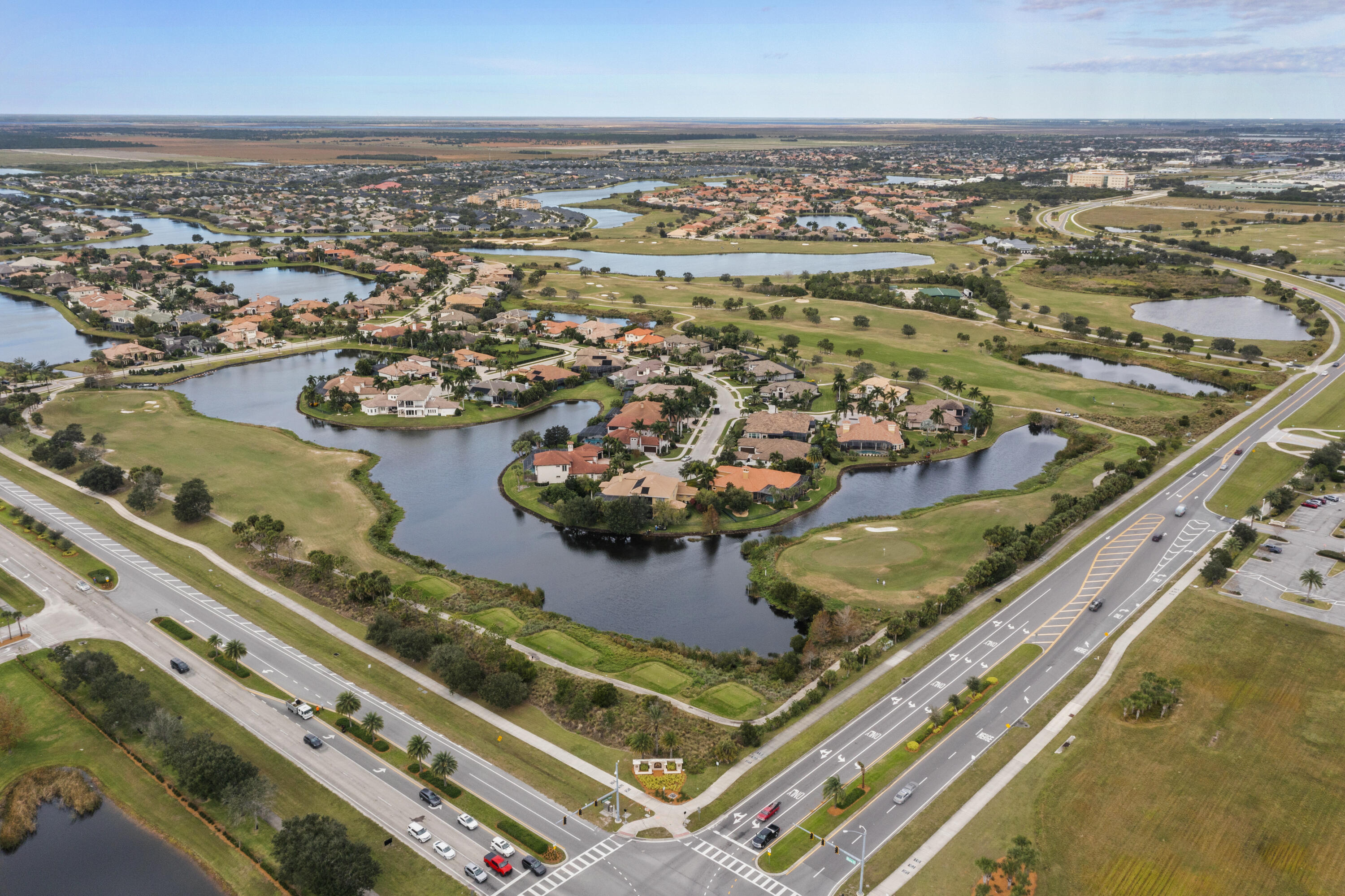 7065 Primavera Lane Melbourne, FL 32940 - Photo 31 of 40 an aerial view of residential houses with outdoor space