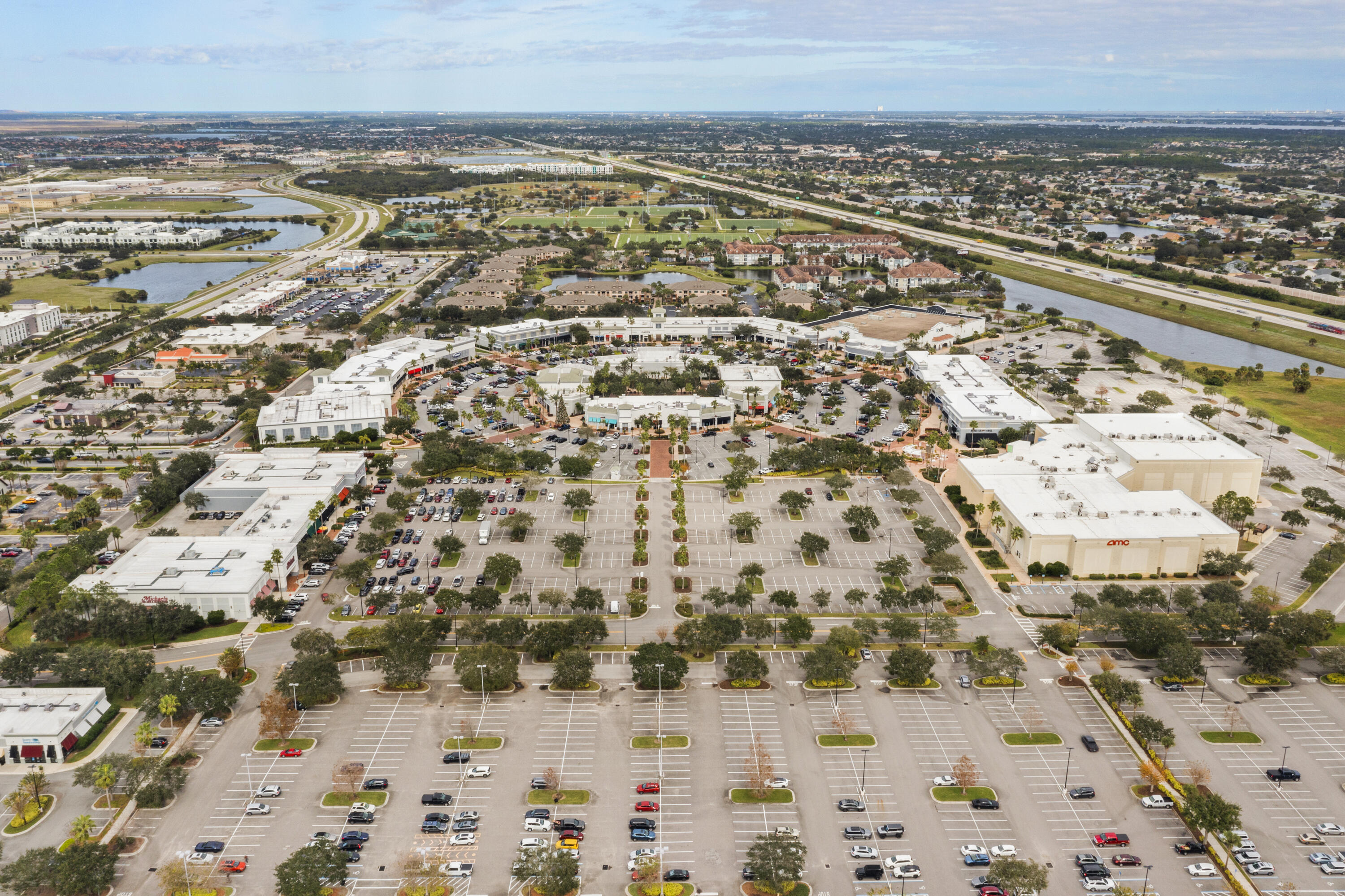 7065 Primavera Lane Melbourne, FL 32940 - Photo 33 of 40 an aerial view of residential building and ocean view