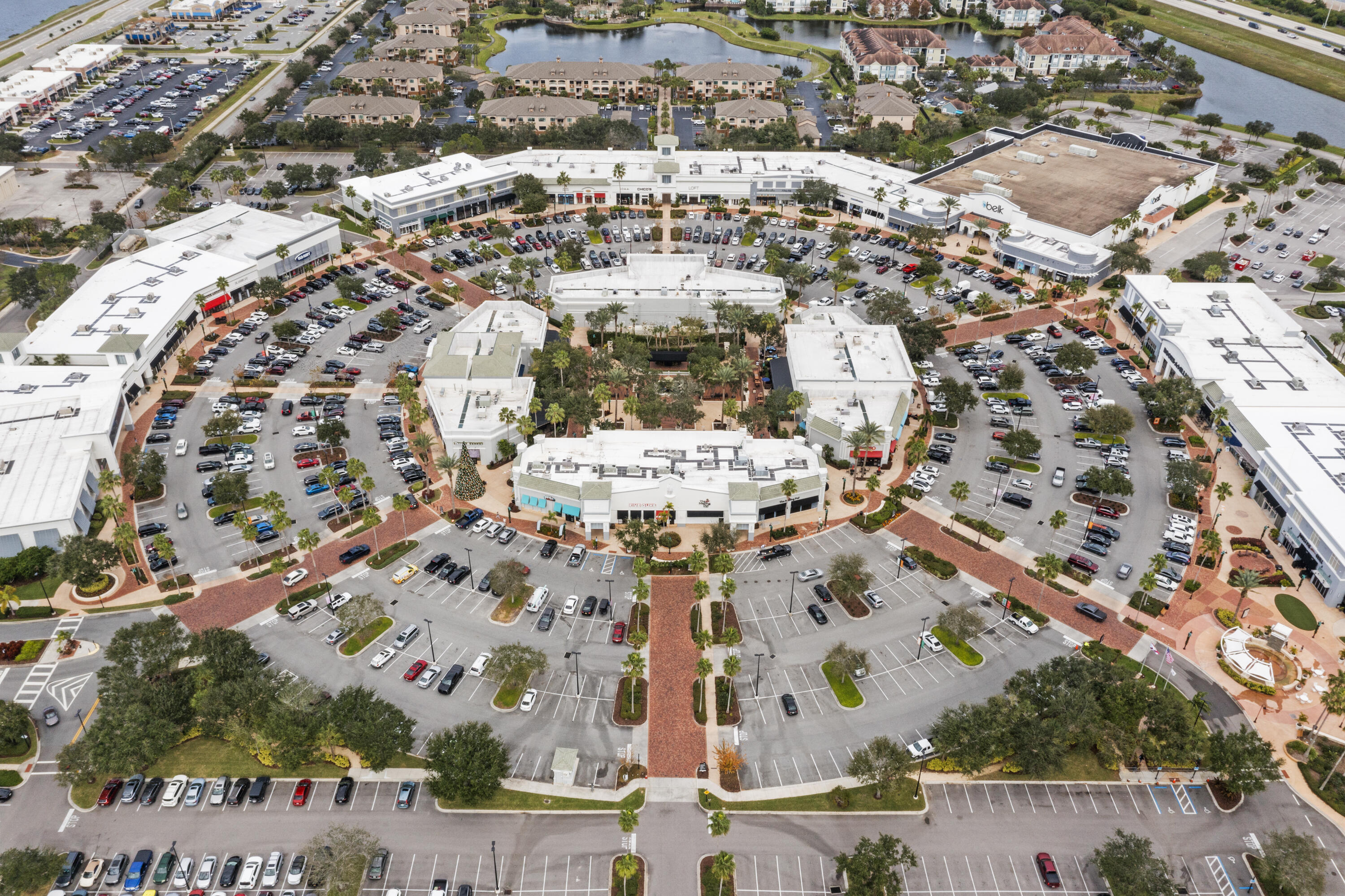 7065 Primavera Lane Melbourne, FL 32940 - Photo 35 of 40 an aerial view of residential houses with outdoor space