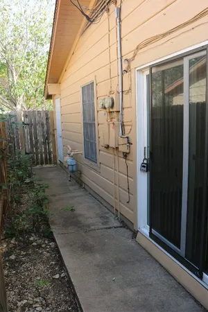 a view of a back yard of the house