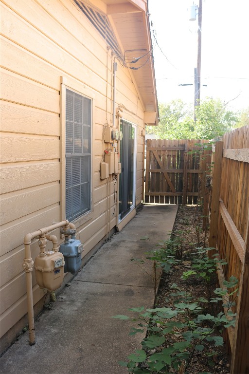 1705 Walnut Street, Unit 3 Georgetown, TX 78626 - Photo 18 of 21 a view of a chair and table in backyard