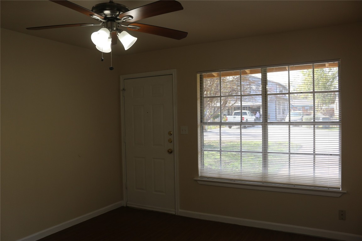 1705 Walnut Street, Unit 3 Georgetown, TX 78626 - Photo 5 of 21 a view of an empty room with a window
