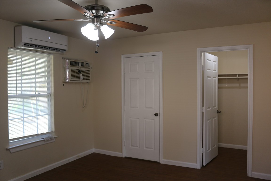 1705 Walnut Street, Unit 3 Georgetown, TX 78626 - Photo 7 of 21 a view of empty room with window and ceiling fan