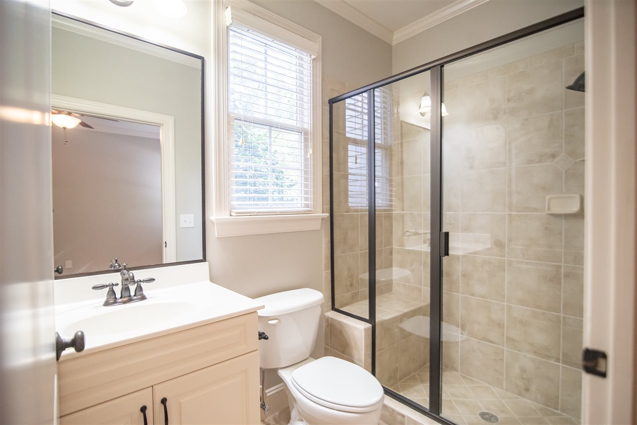 3736 Falls River Avenue Raleigh, NC 27614 - Photo 10 of 30 Features shower and vanity. Located on the first floor, ideal for guests. Bathroom