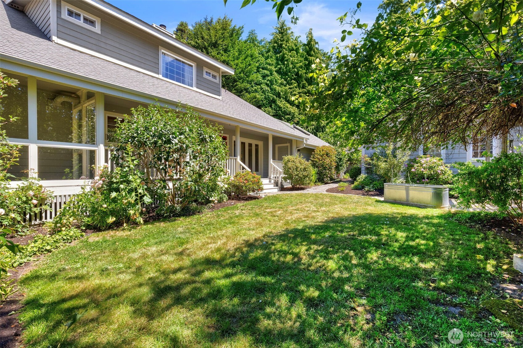 1757 Maple Street Port Townsend, WA 98368 - Photo 28 of 40 a view of a house with backyard and garden
