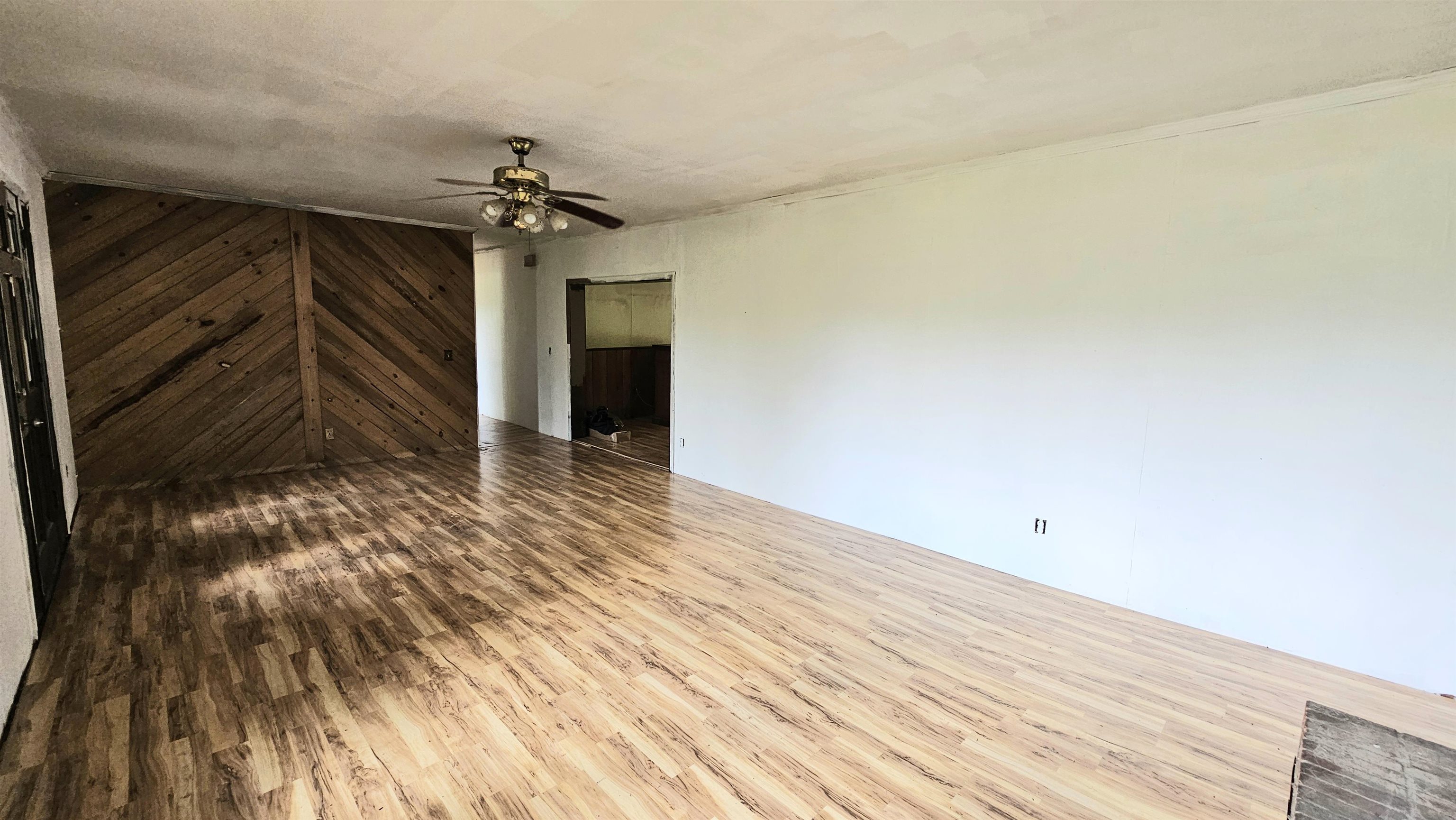 1570 Bear Creek Road Collinwood, TN 38450 - Photo 5 of 12 a view of empty room with wooden floor