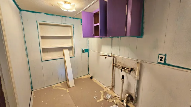 a view of a room with rack on the wall