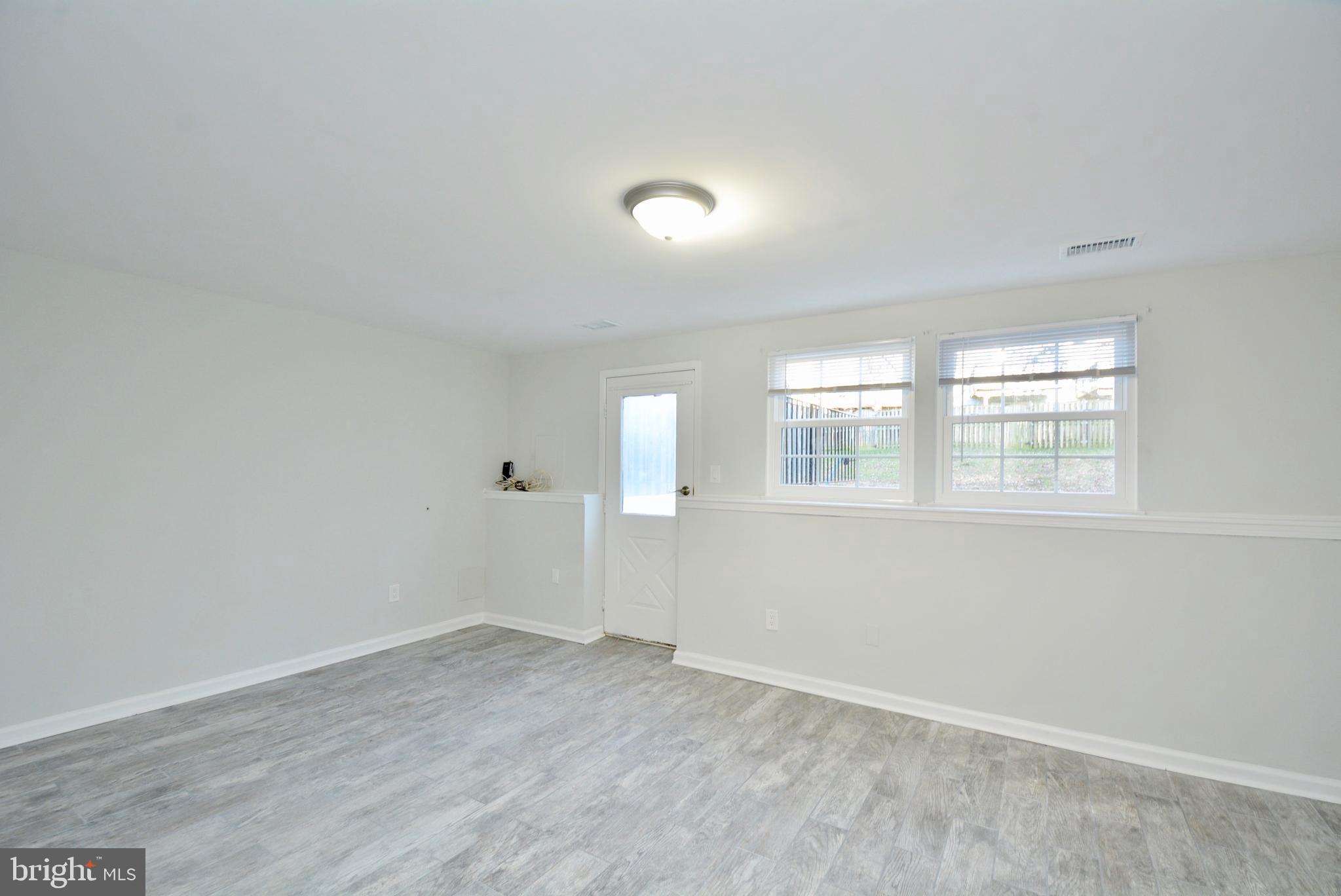 7459 Lone Star Road Lorton, VA 22079 - Photo 21 of 29 Rec room has walk out to backyard
