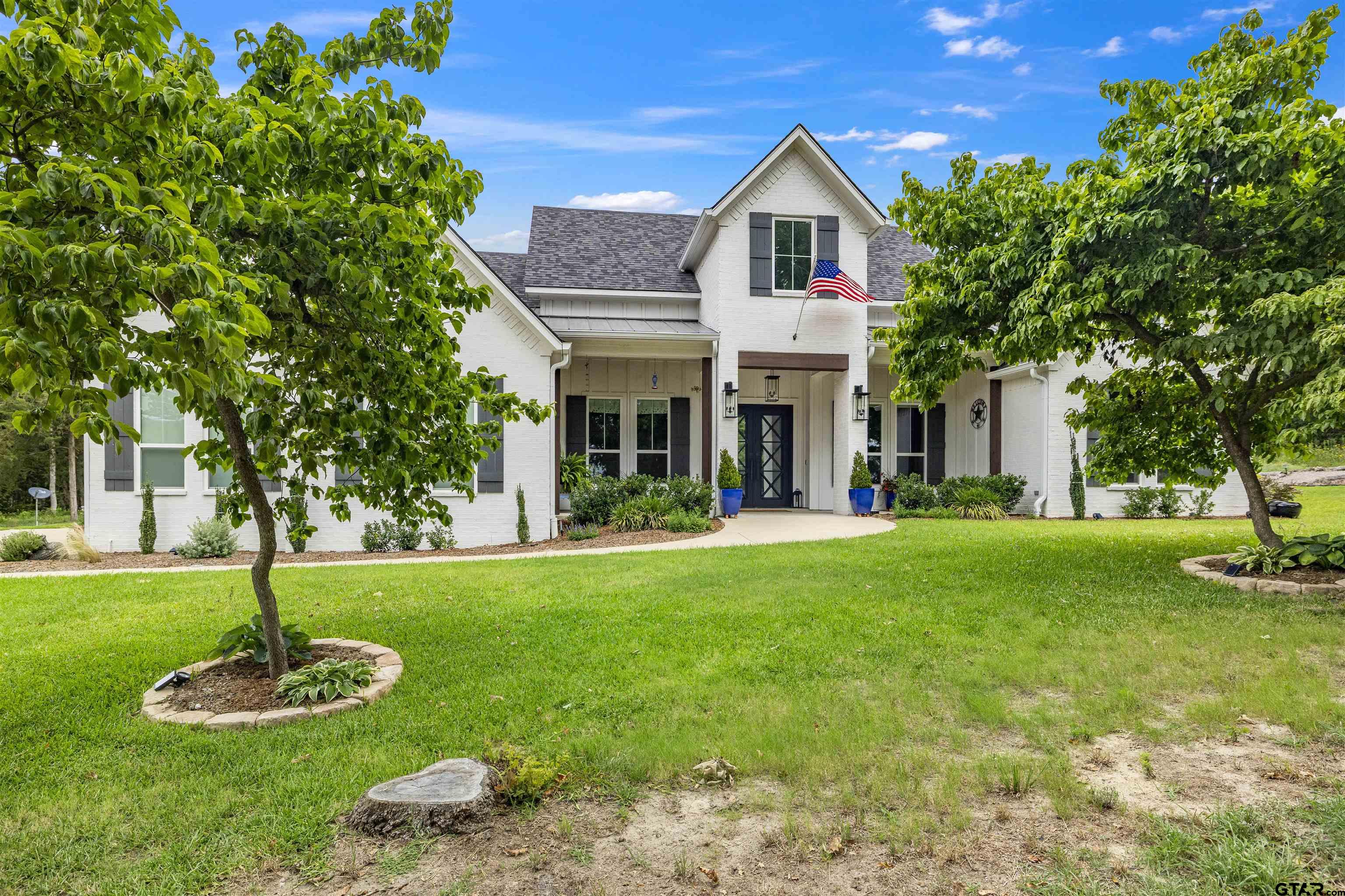 23316 Fm 1995 Lindale, TX 75771 - Photo 1 of 47 a front view of a house with a yard and tree