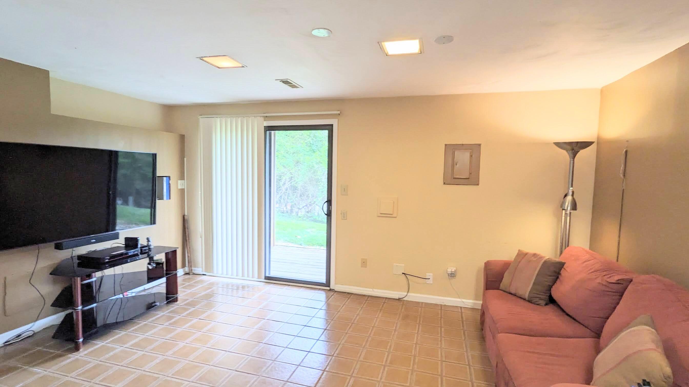 3420 Morning Dove Road Roanoke, VA 24018 - Photo 26 of 33 a living room with furniture and a flat screen tv