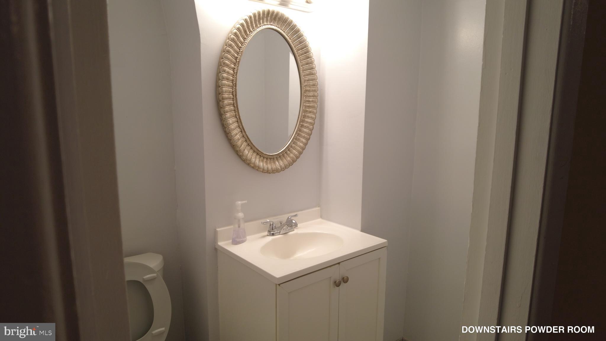 3901 92nd Avenue Springdale, MD 20774 - Photo 9 of 48 Downstairs Powder Room 1
