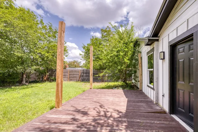 a view of a porch with a backyard